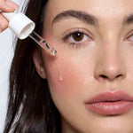 application sur le visage du sérum purifiant endro