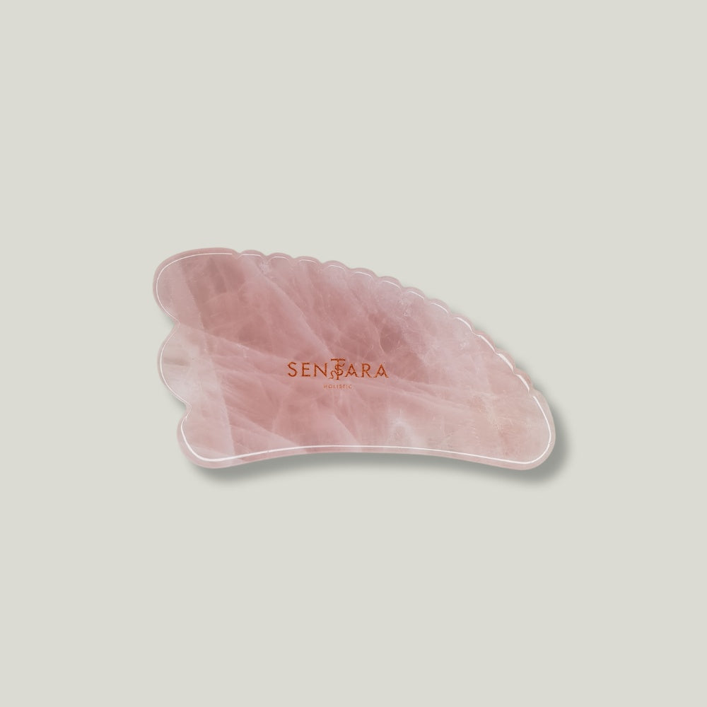 gua sha corne à dents en quartz rose Sentara Holistic