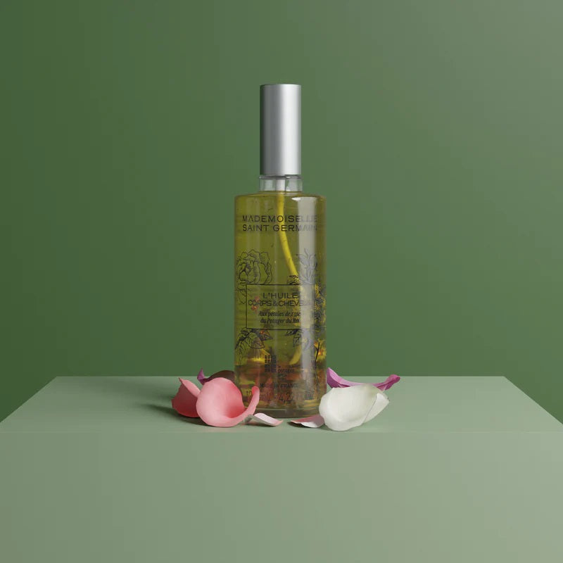 packaging avec decor de rose et vert huile corps et cheveux mademoiselle saont germain