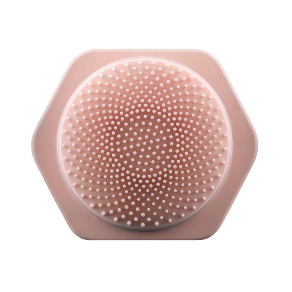 Zoom sur la tête de la brosse en forme de rosace de la brosse nettoyante visage L1 rose Lauvée Paris